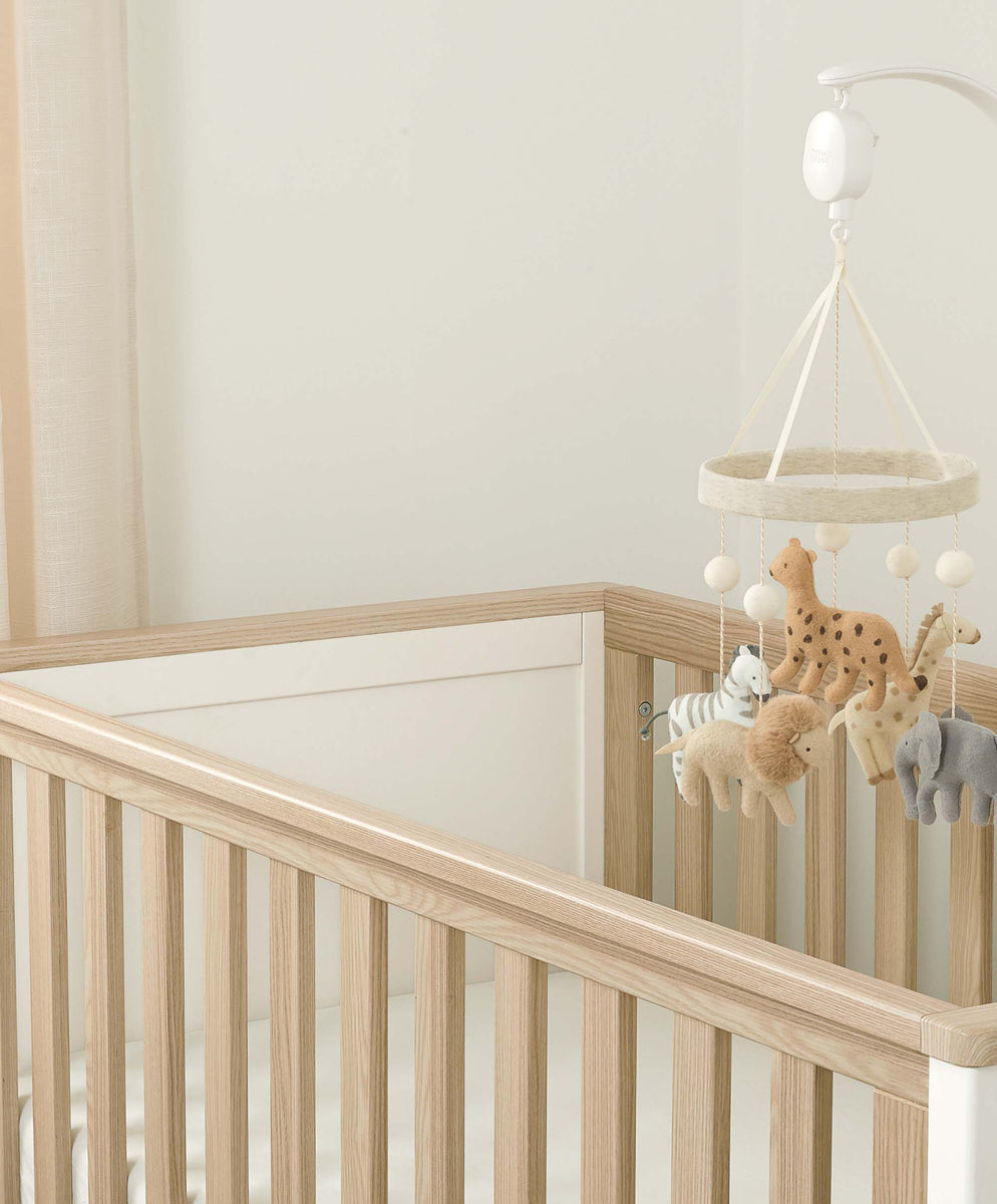 Musical cot sales mobile uk