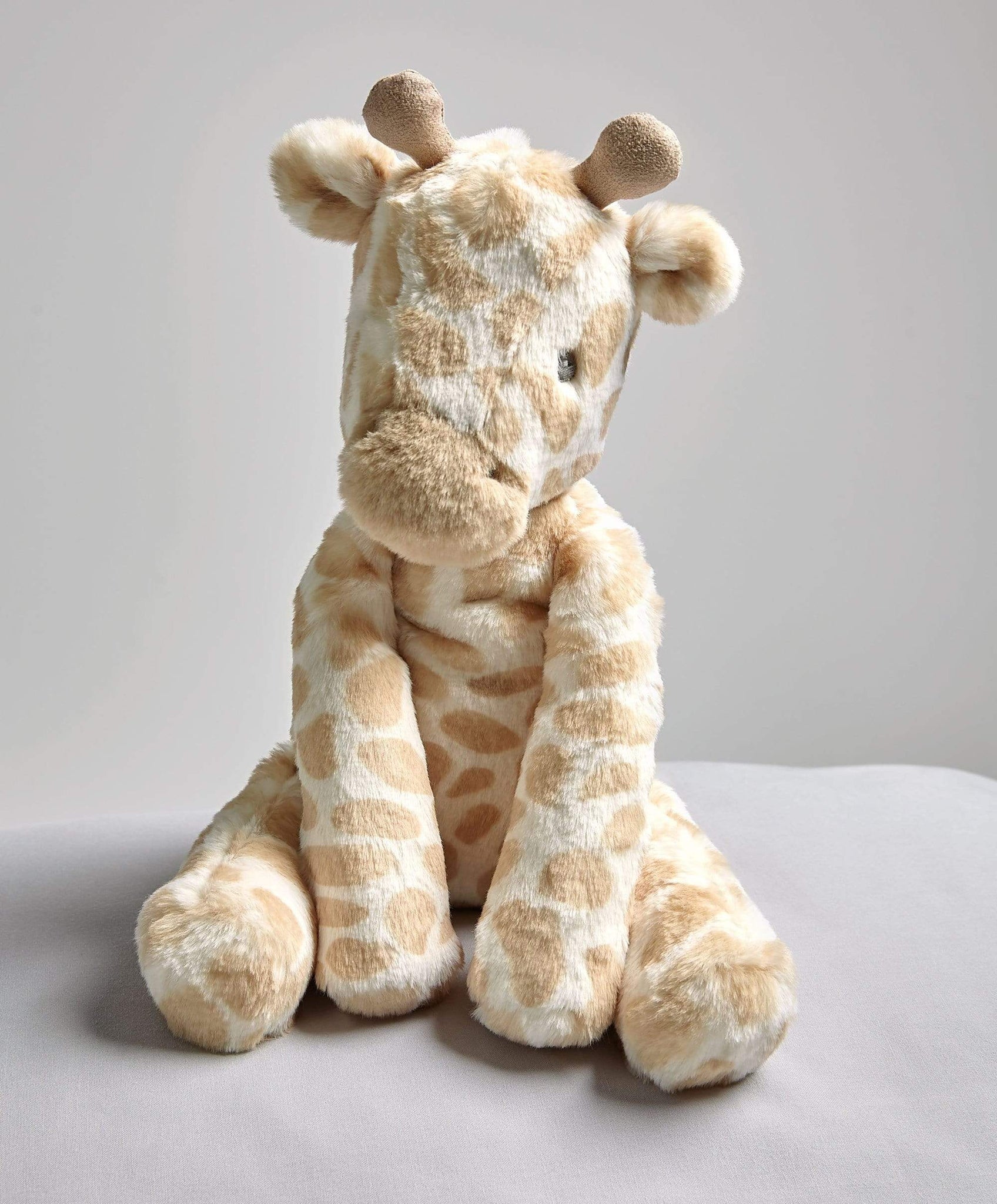 https://www.mamasandpapas.ie/cdn/shop/products/mamas-papas-soft-toys-welcome-to-the-world-soft-toy-geoffrey-giraffe-28262674071712_1024x1024@2x.jpg?v=1628429883